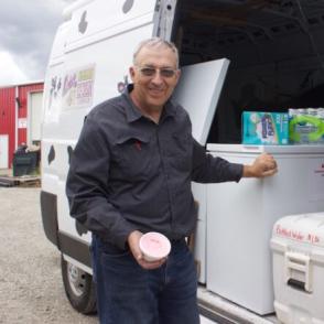 Man standing next to Ice Cream Truck