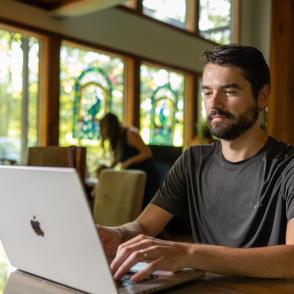 Person using a MacBook