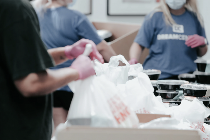 Volunteers Serving Food photo by  Joel Muniz