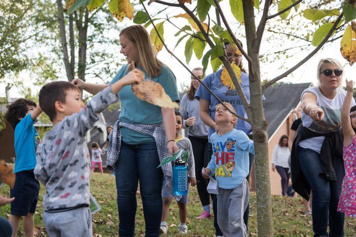 Children looking for leaves at Sustainability event