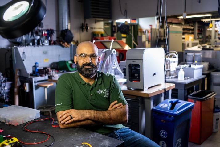 Graduate student Yahya Al Majali sitting at a table