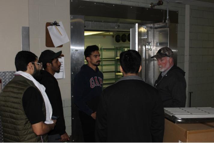 Picture of Students examining Shively Hall systems