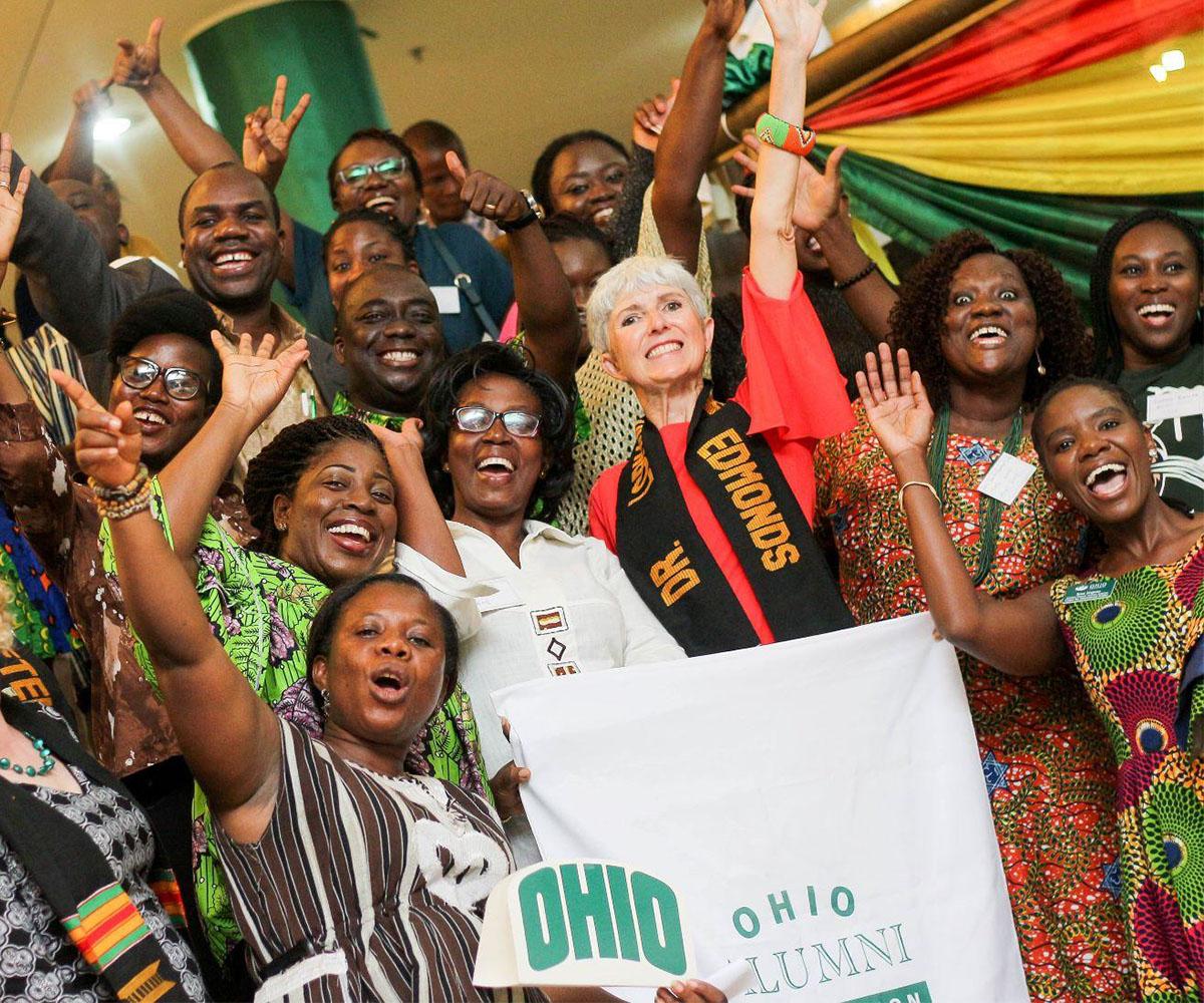 A group of OHIO international alumni pose for a photo.