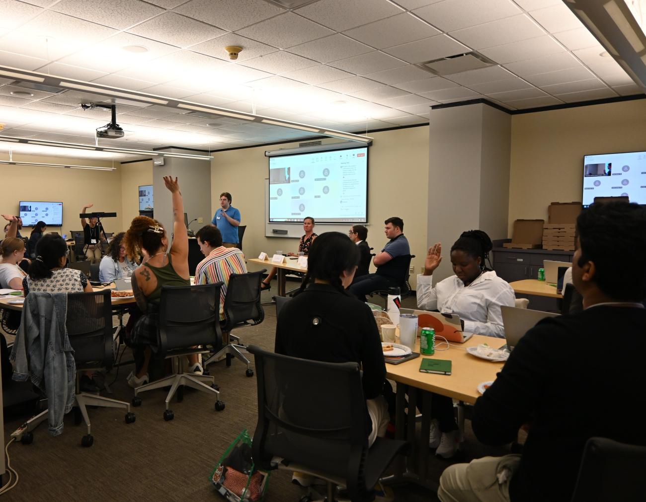 A group of people engaging in an informational panel