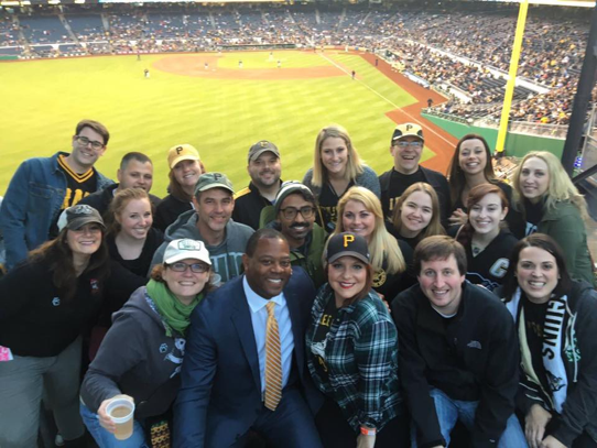 group of people at baseball game