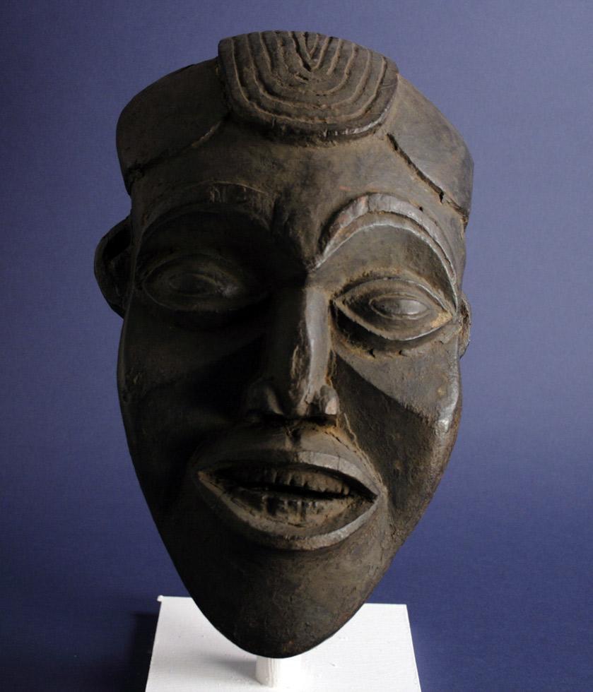 Mask,  20th c.,  Cameroon Grassfields,  wood, pigment,  16 x 9.5 x 6.5in ( 40.6 x 24.1 x 16.5cm),  81.054.F0.