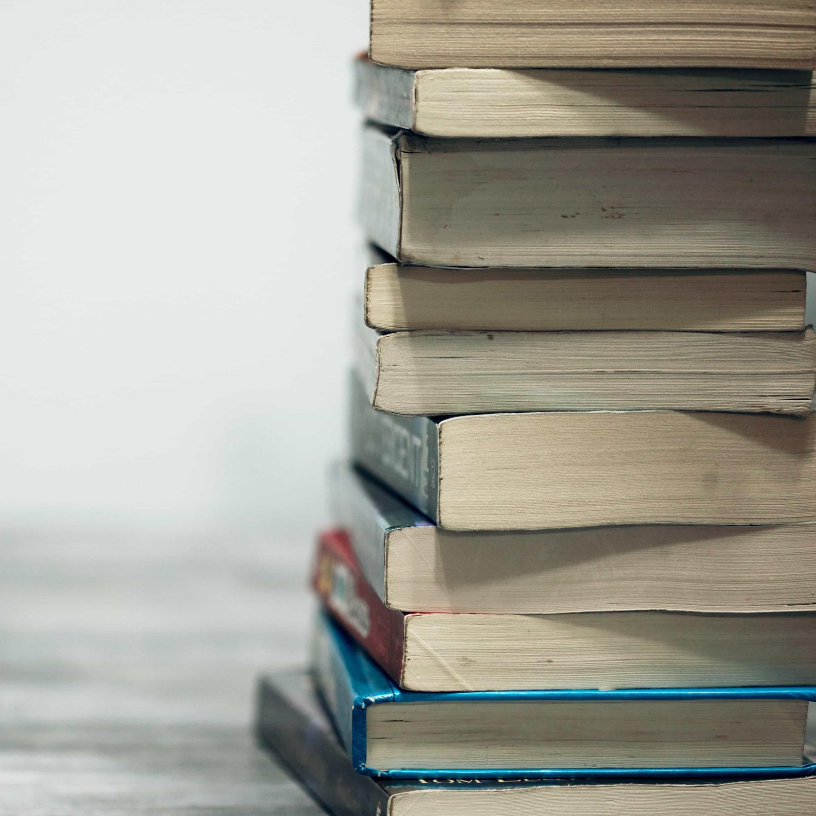 Close-up of stacked textbooks