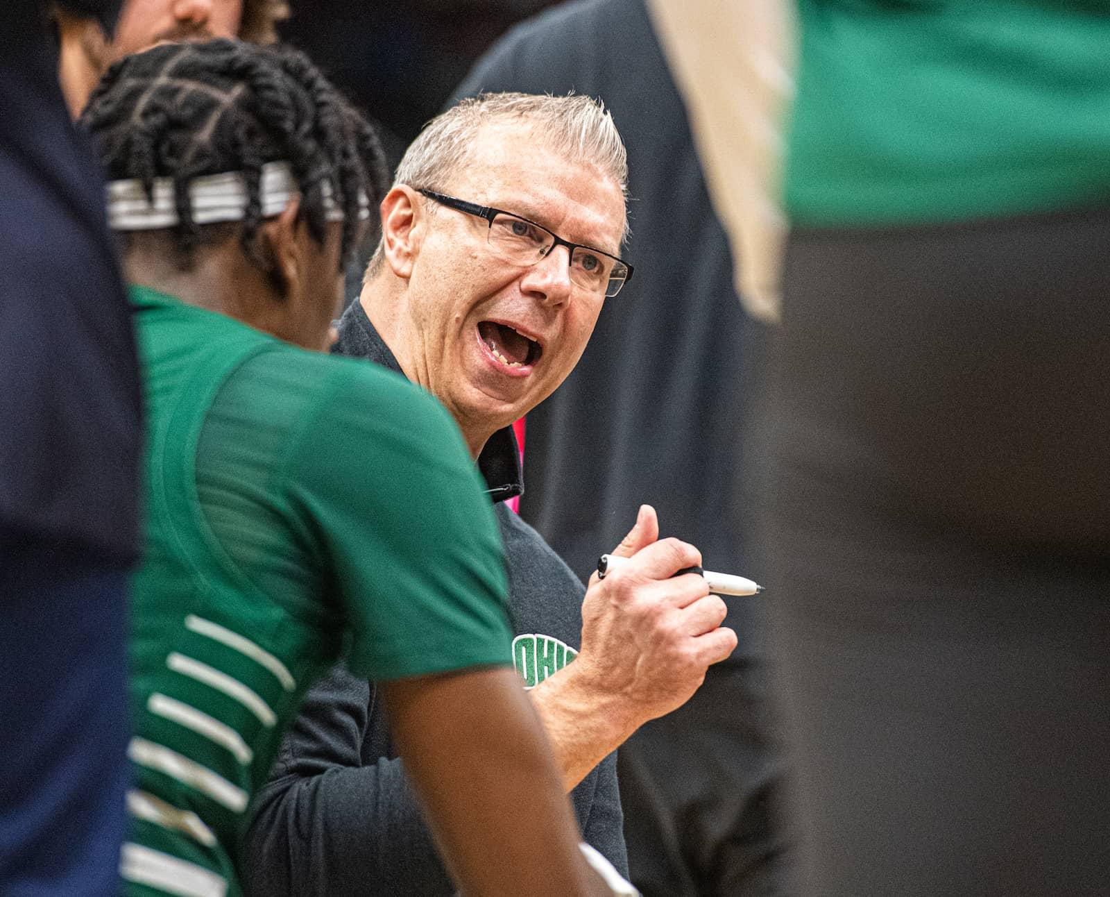 Ohio head coach Jeff Boals speaks to his team during a timeout in the second half of the Bobcats’ semifinal game vs. Toledo. 