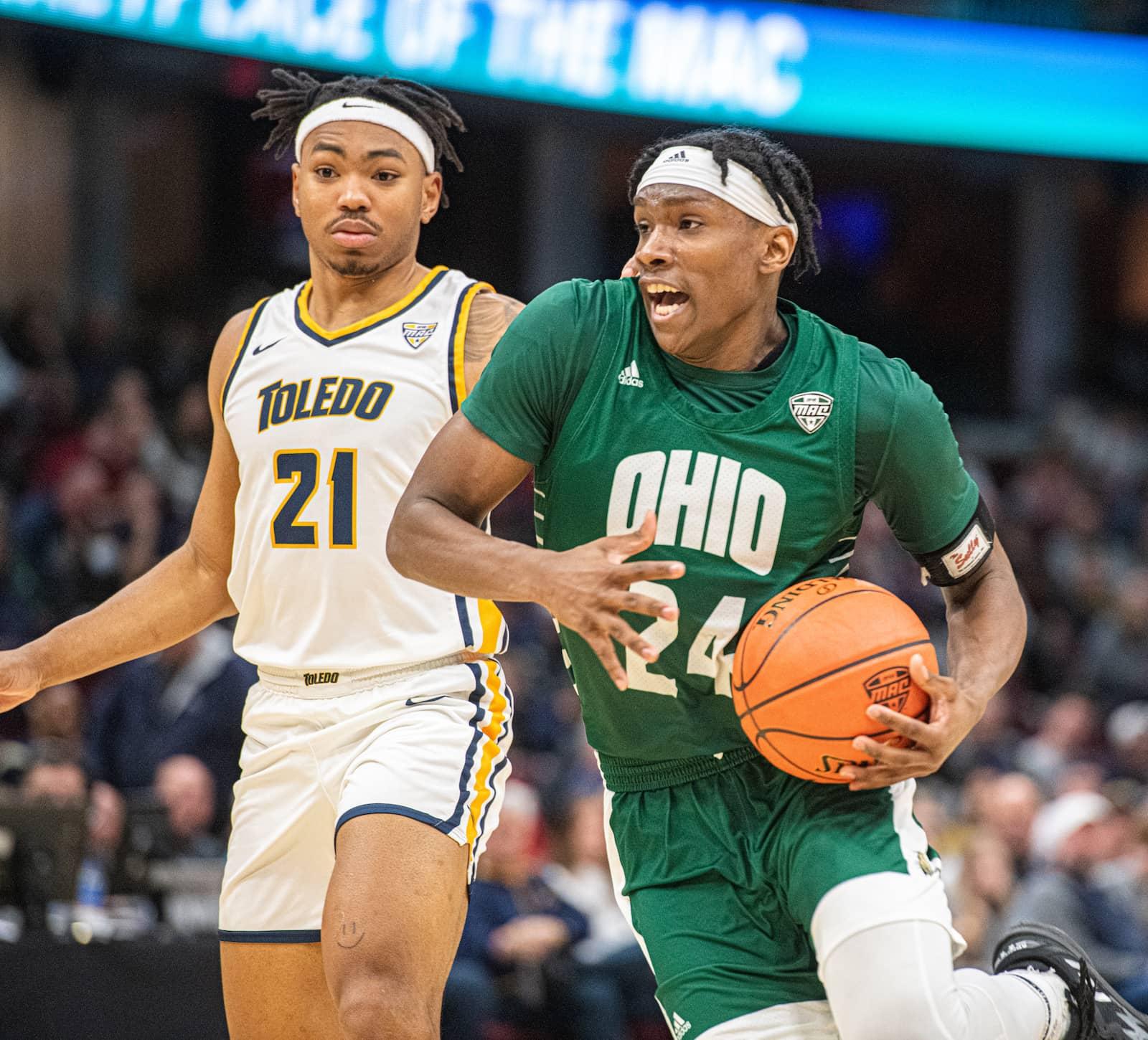 Ohio freshman AJ Brown drives the ball to the hoop against a Toledo defender. 