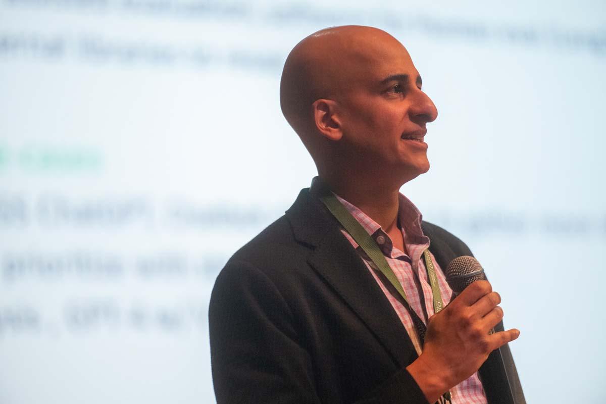 Dan Shah. leader of data science at IGS Energy, speaks at the IA Symposium.