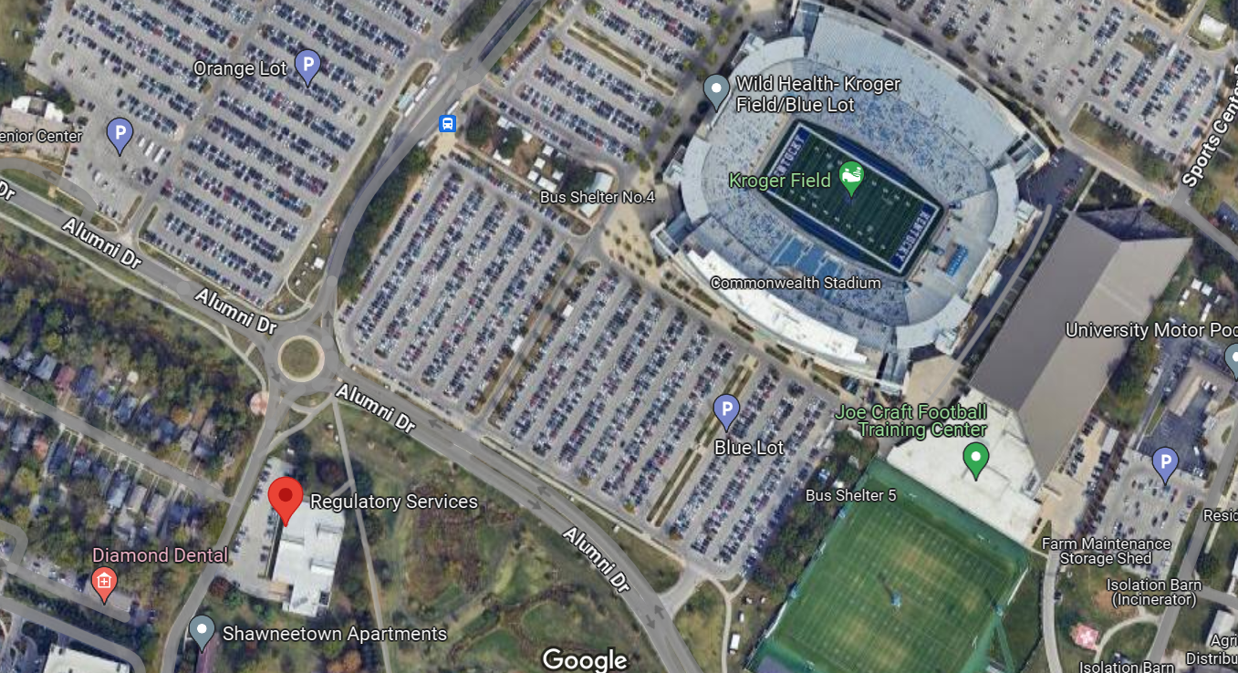 Overhead view of football field with street names listed and location pins.