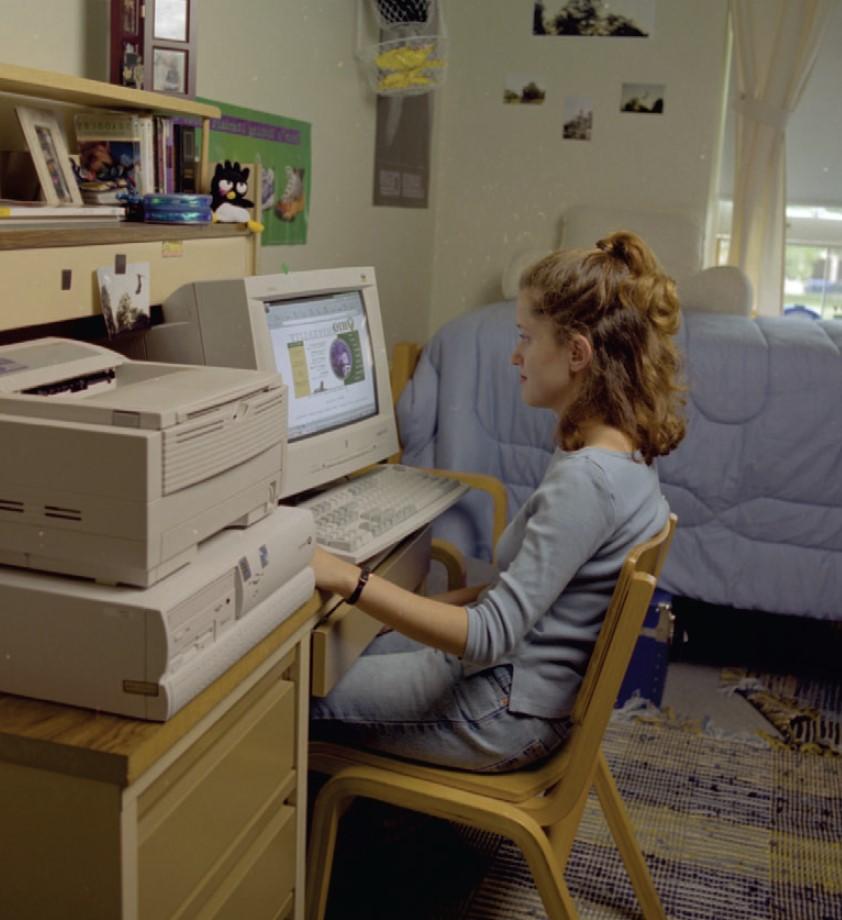 Student using new computers in residence hall room