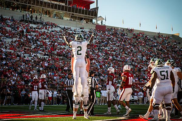 Ohio senior running back Anthony Tyus scores a touchdown and is held up by a teammate during the Battle of the Bricks on Saturday, October 19, 2024.