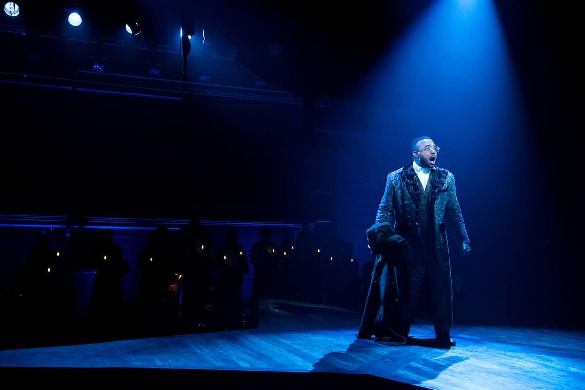 Person acts on stage during a theatre performance