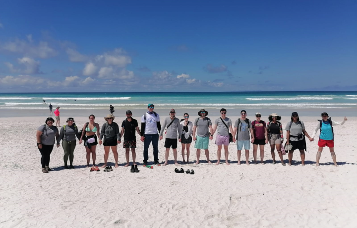 Group photo on the beach in Galapagos.