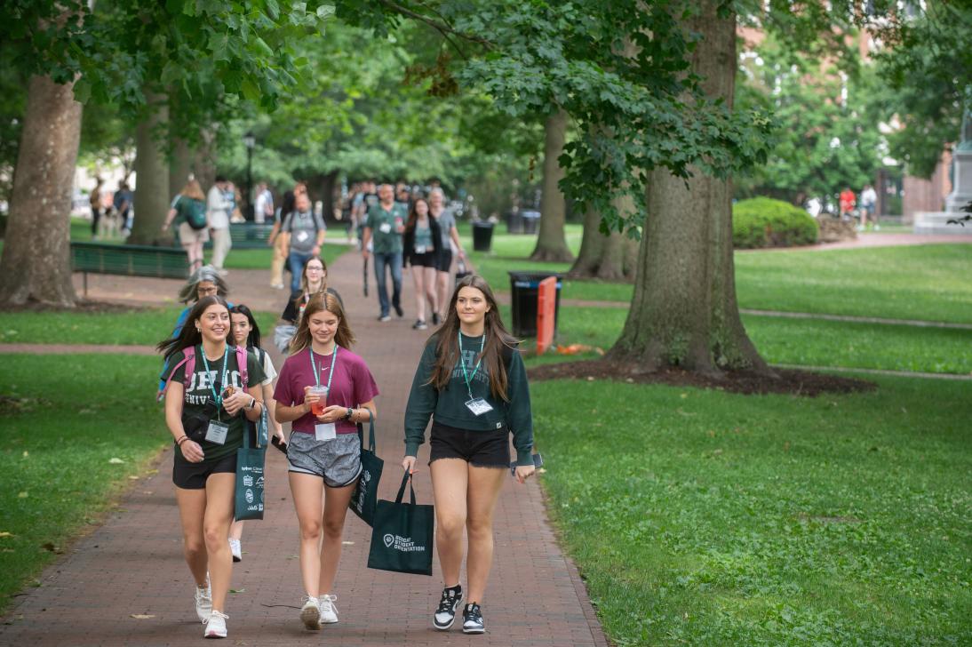 orientation participants walking on college green