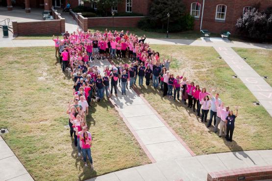 Southern campus staff form pink ribbon