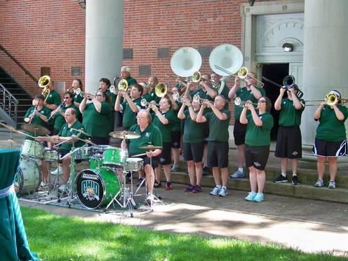 Alumni Varsity Band plays outside Memorial Auditorium on College Green
