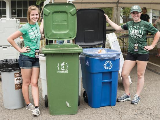 Students with recycling bins