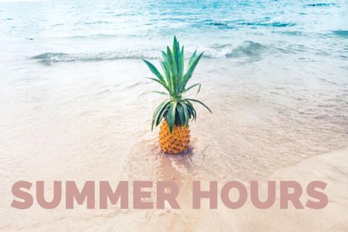 Summer Hours. Pineapple sticking out above the sand.