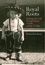 Black and white image of little kid in cowboy hat.