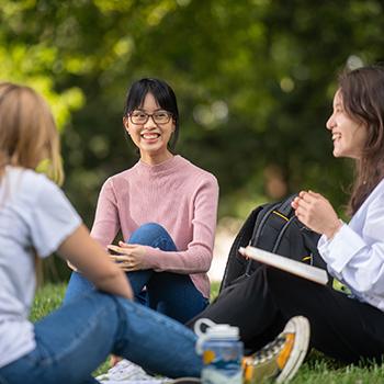 International students sitting and enjoying time together