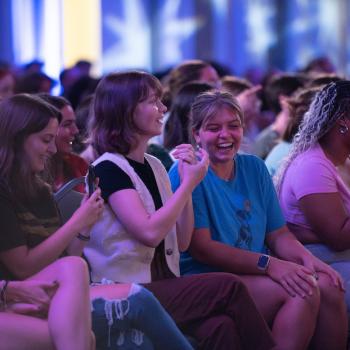 students in the audience at a hypnotist event