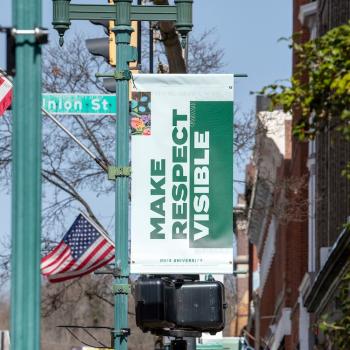 Make Respect Visible street lamp banner in uptown Athens