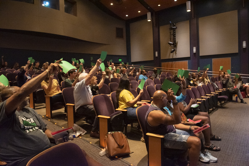 Audience members vote on the subject of a video's innocence during