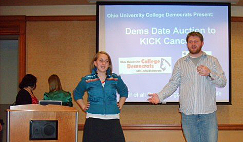 Dorans presenting at a College Democrats meeting in college