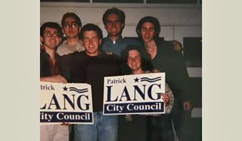 Patrick Lang and friends holding up signs for his city council campaign