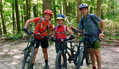 Peter Kotses and his kids on the bike trail