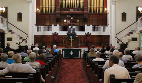 Jack Marchbanks speaking at a church