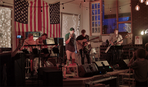 Fearless starlight performing on stage at a bar