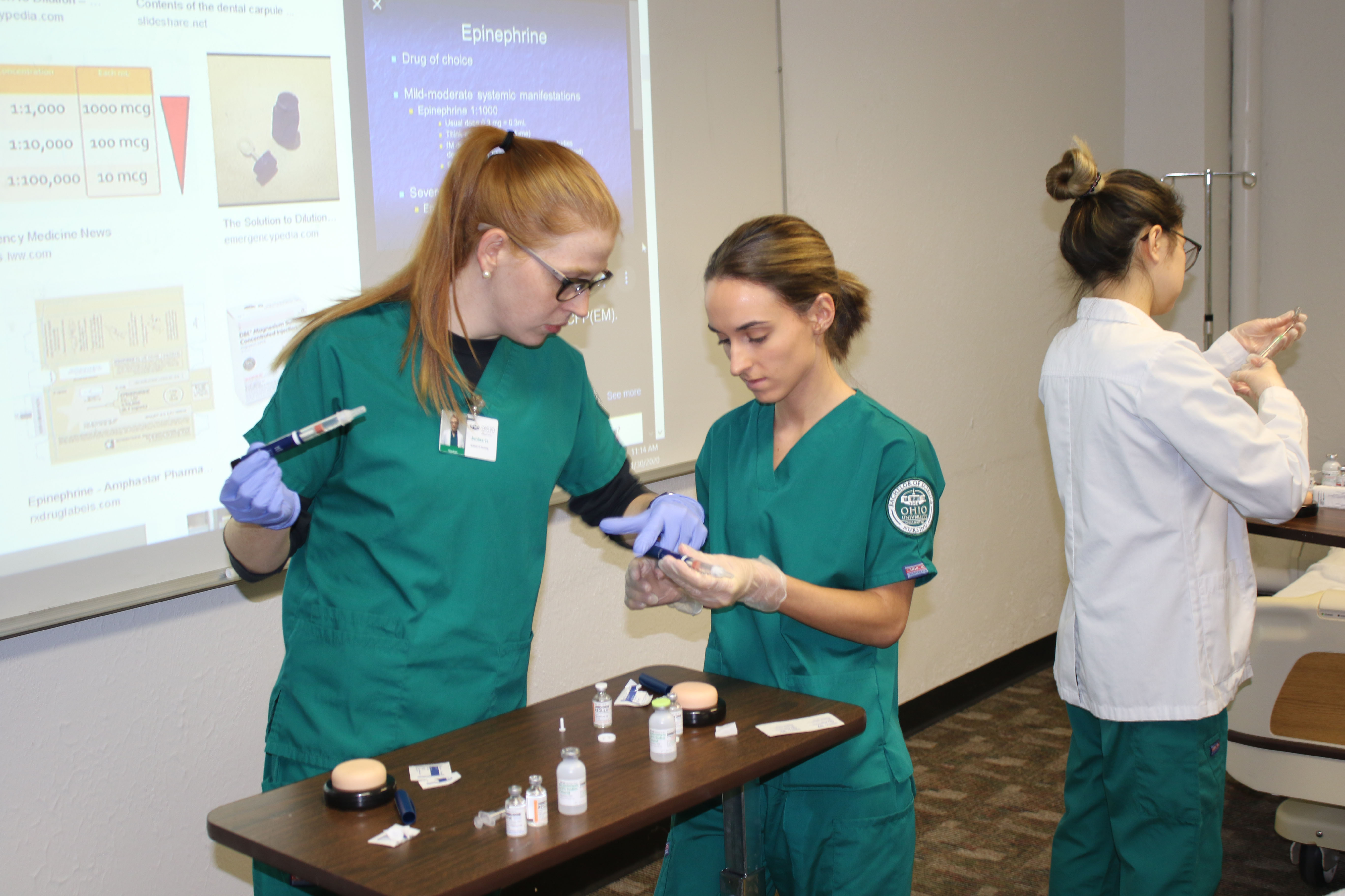 BSN students learning how to administer injections in a new lab space