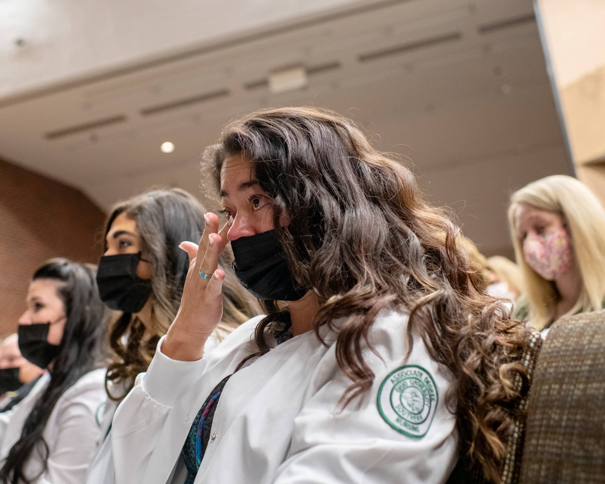 A nursing student sheds a tear during the December 2021 Nursing Pinning & Recognition Ceremony at the Southern Campus.