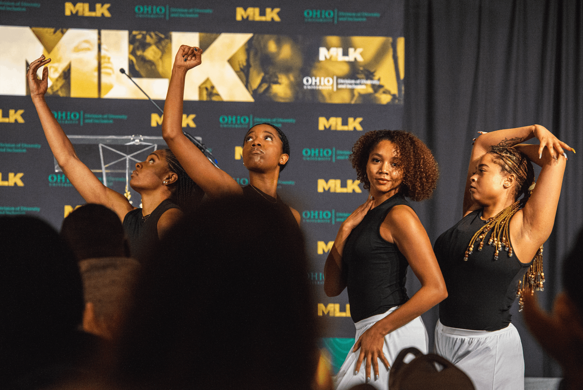 The Athens Black Contemporary Dancers, which includes Ania Fuller, Makayla Moore, Najah Carson, and Alexis Fuqua, are shown performing  at the Martin Luther King Jr. Celebration brunch at Baker Center.