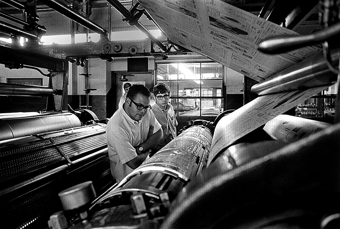 taff members from The Post watch as the first edition of the newspaper for the 1968-69 academic year rolls off the presses at The Athens Messenger