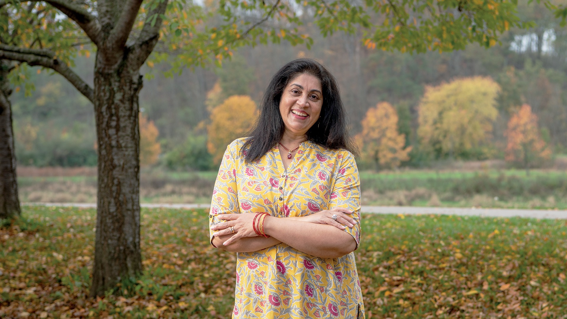 Christine Suniti Bhat poses by the bike path