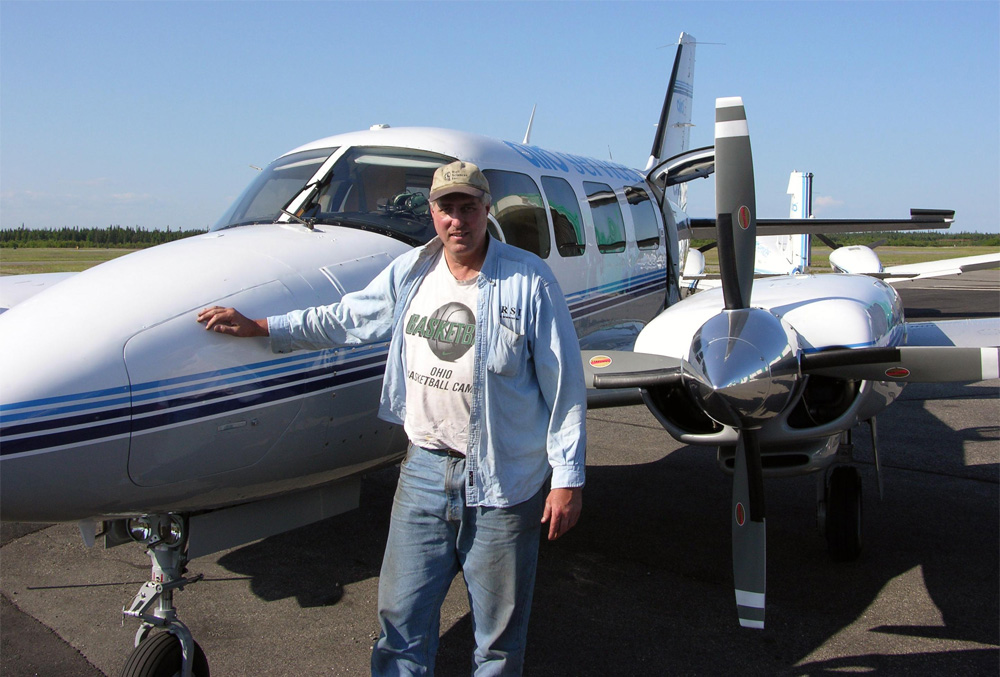 A four-year member of the Ohio University Men’s Basketball Team that took the Bobcats to the 1970 MAC Championship and NCAA Tournament, Gary Wolf, BSEE ’71, proudly wears his OHIO basketball shirt while visiting Labrador, Canada. Photo courtesy of Gary Wolf