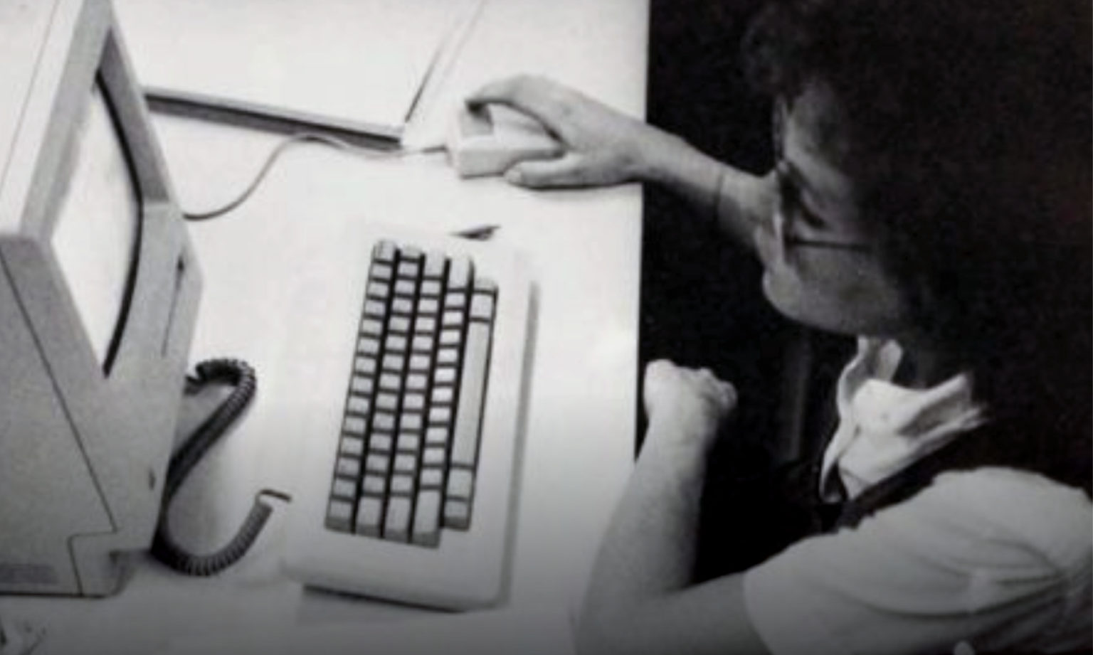 A student works on a MacIntosh computer in Scripps Hall in 1988