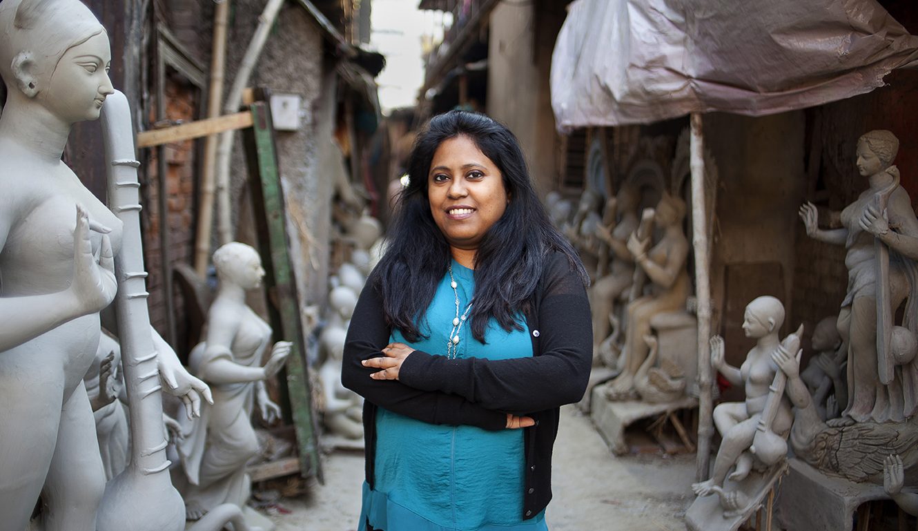 Purba Das standing among statues in Kolkata, also known as Calcutta, in the West Bengal state of her native India.