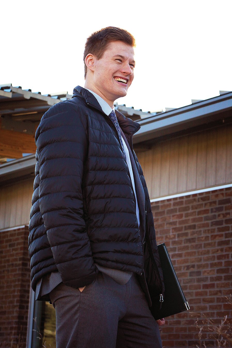 Zach Hadley standing outside a building