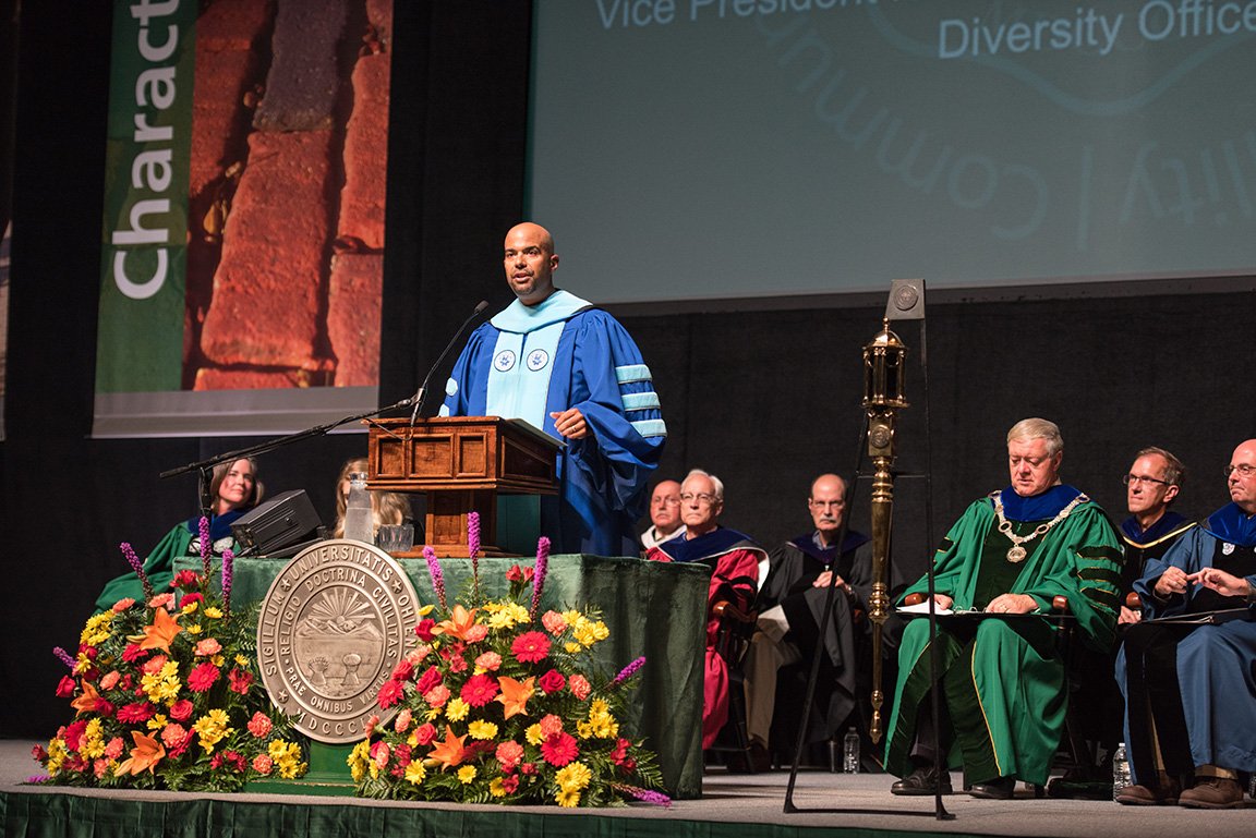 Jason Pina, vice president for student affairs, speaks at the President's Convocation for First-Year Students at the Convocation Center. Photo by Ben Siegel, BSVC '02