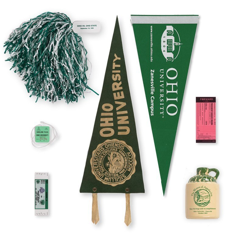 athletic memorabilia, including banners, tickets and pompon
