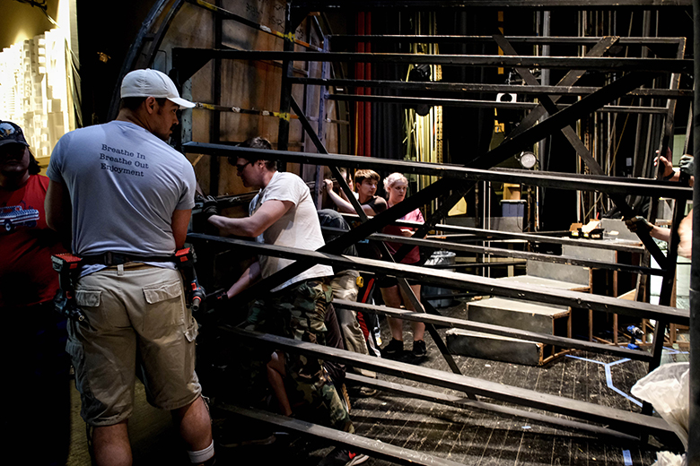 OHIO theater students and touring production staff build the set for Beauty and the Beast.