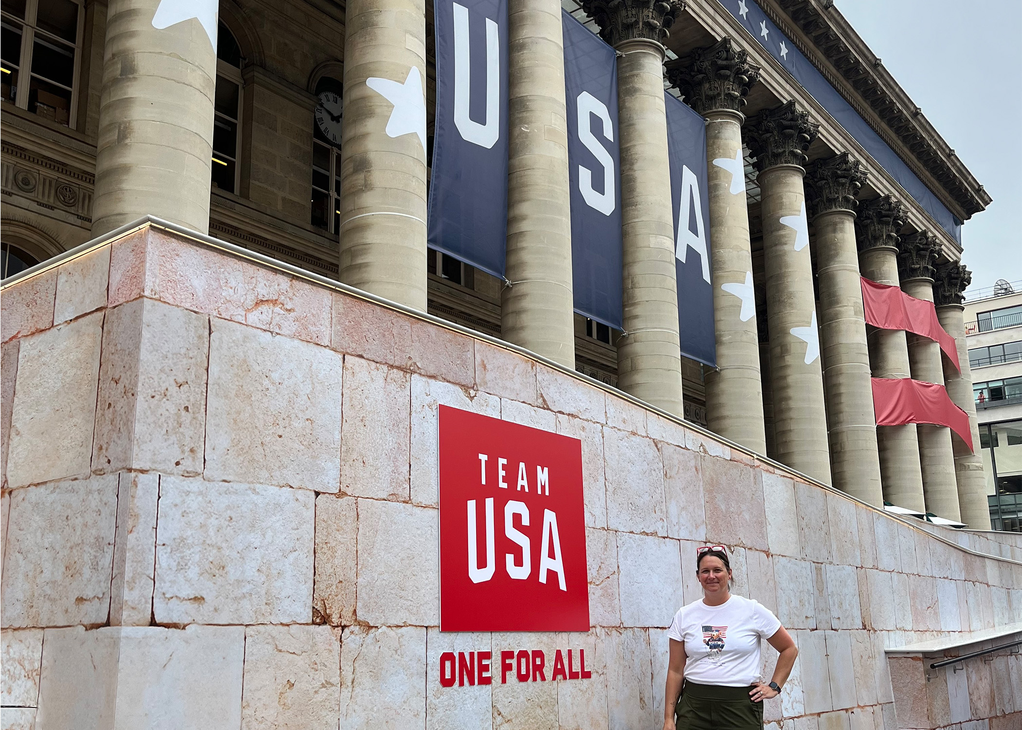 Lisa Milne poses in front of the Team USA House during the 2024 Olympic Games