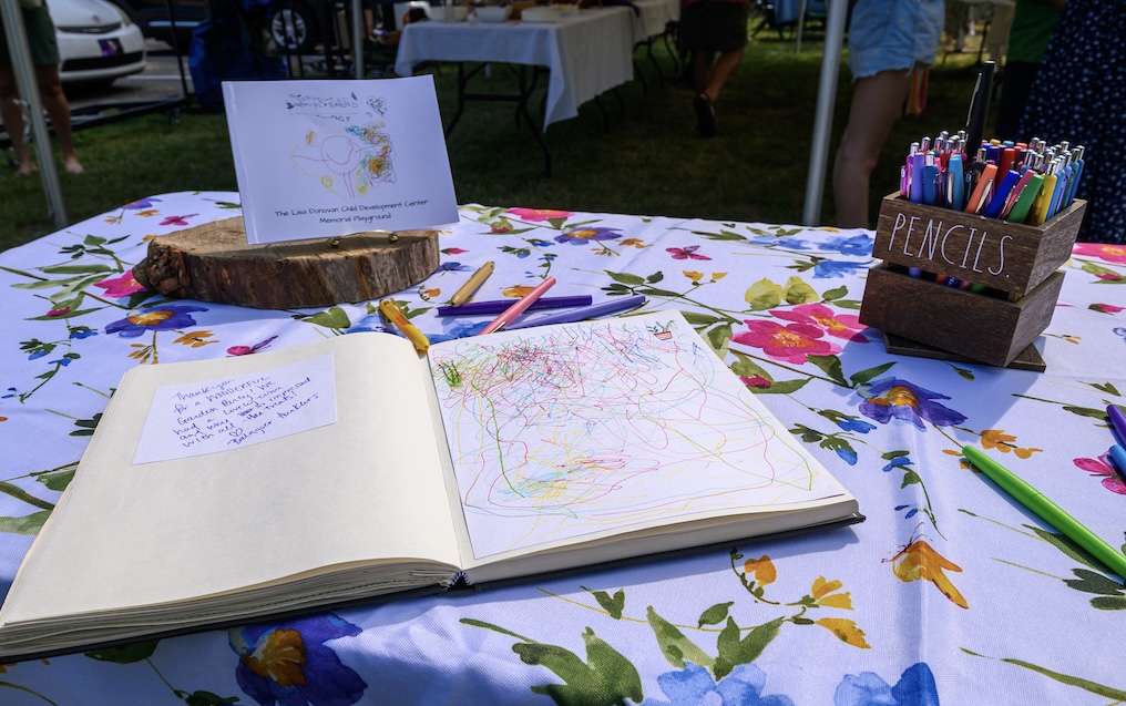 Notepad on table with colorful drawings