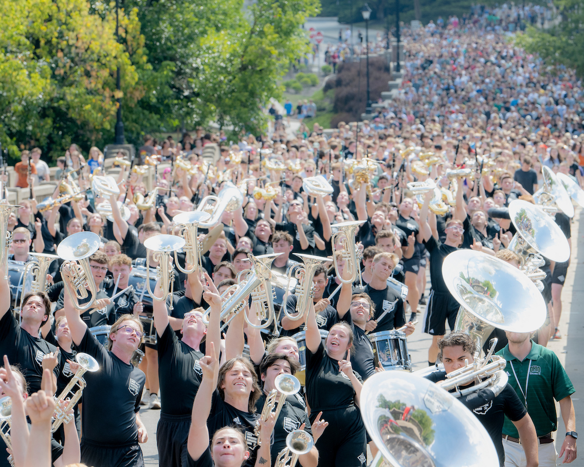 Students walk up Richland Avenue in Athens during Welcome Week 2024