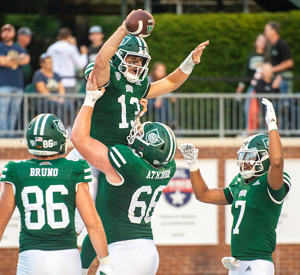 The OHIO Football team celebrates a big score. 